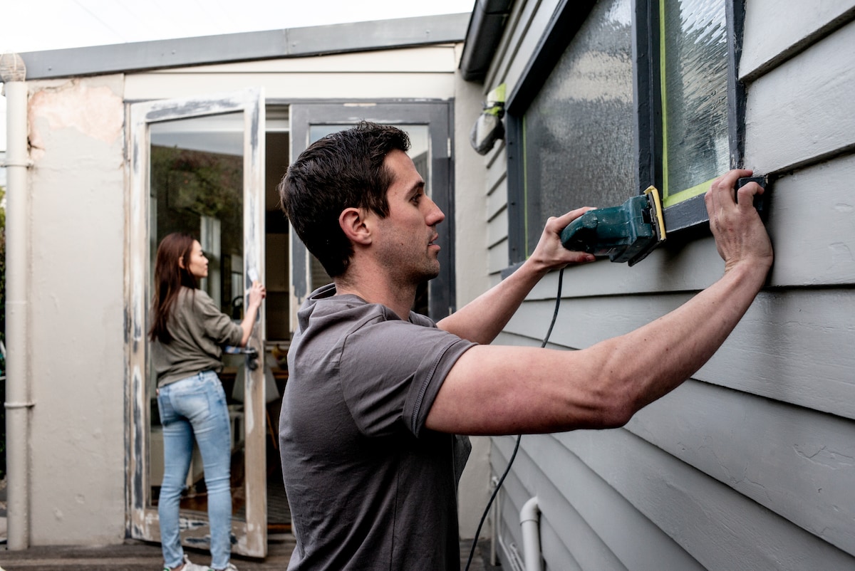 Husband and wife renovating their home