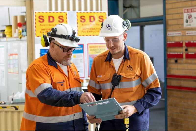 Team members discussing safety at one of our Energy Operations locations