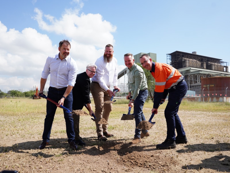 Executives, along with local and federal government representatives, breaking ground for a new project at the power station site.