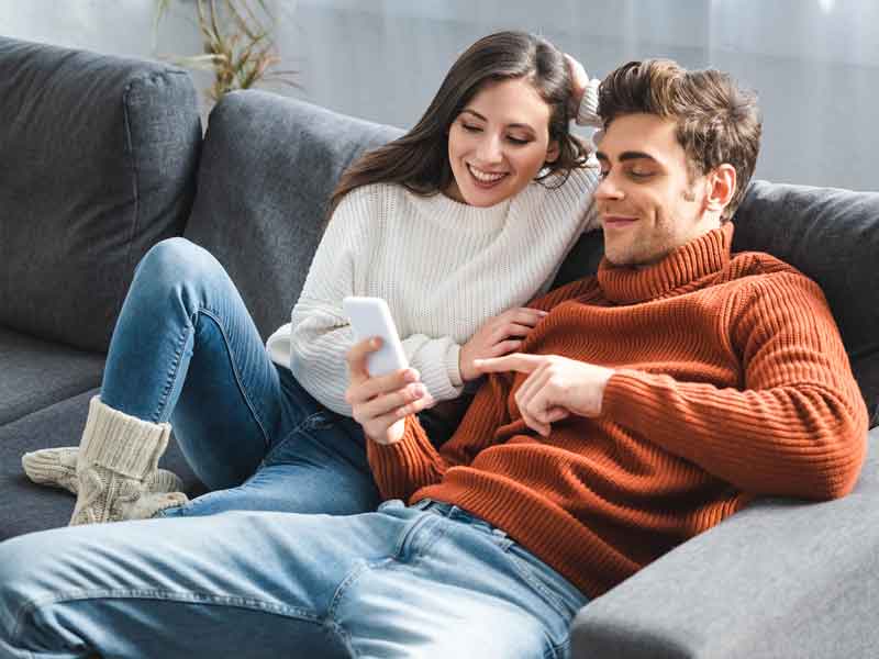 A couple looking at mobile